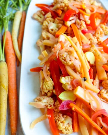 Pickled Cauliflower and Carrots with fresh Colorful Carrots