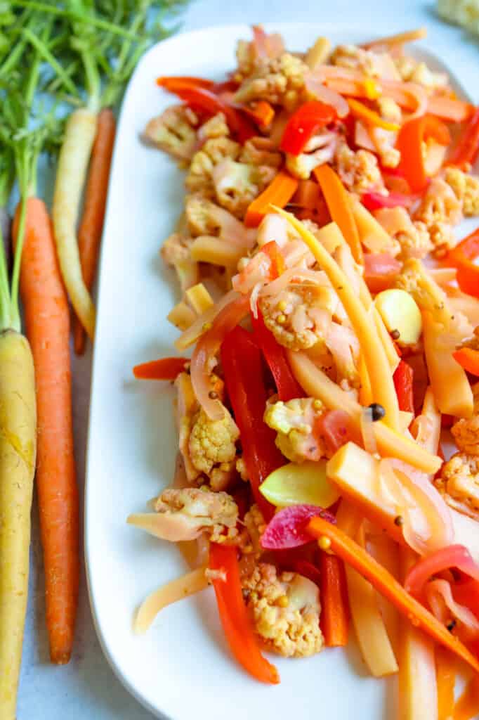 Pickled Cauliflower and Carrots with fresh Colorful Carrots
