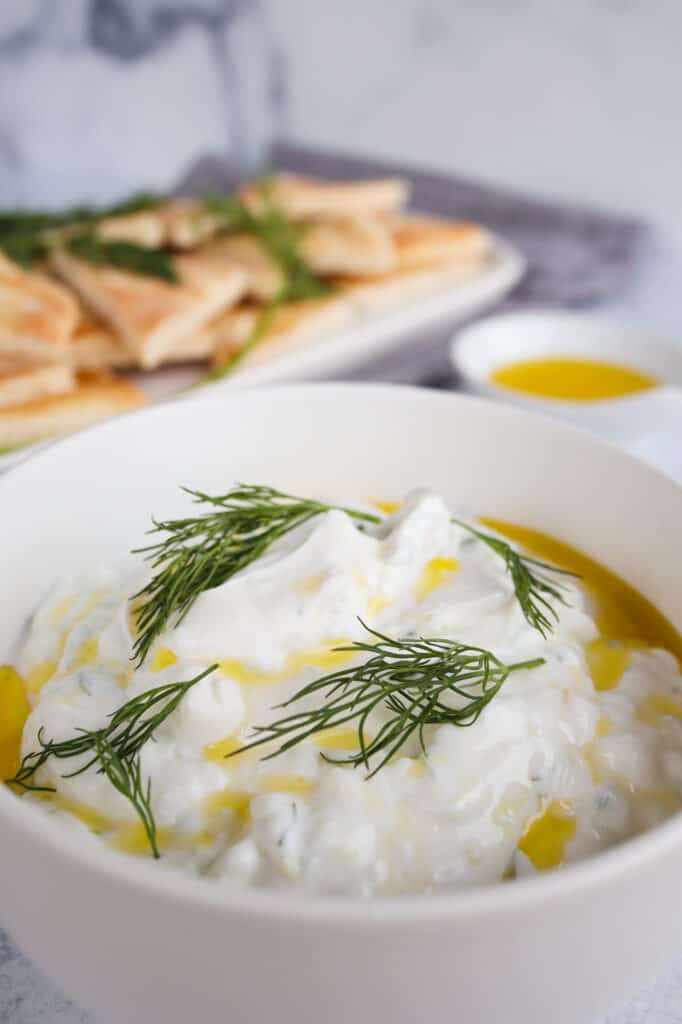 Homemade Tzatziki sauce with garlic infused olive oil and fresh dill