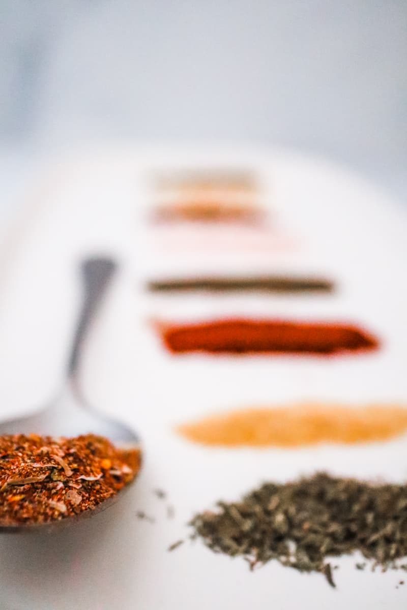 with Paprika, Cayenne Pepper, Black Pepper, Garlic Powder, Onion Powder, Dried Thyme, and Dried Oregano.