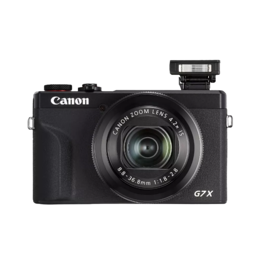 Black Canon Camera with flash popped up