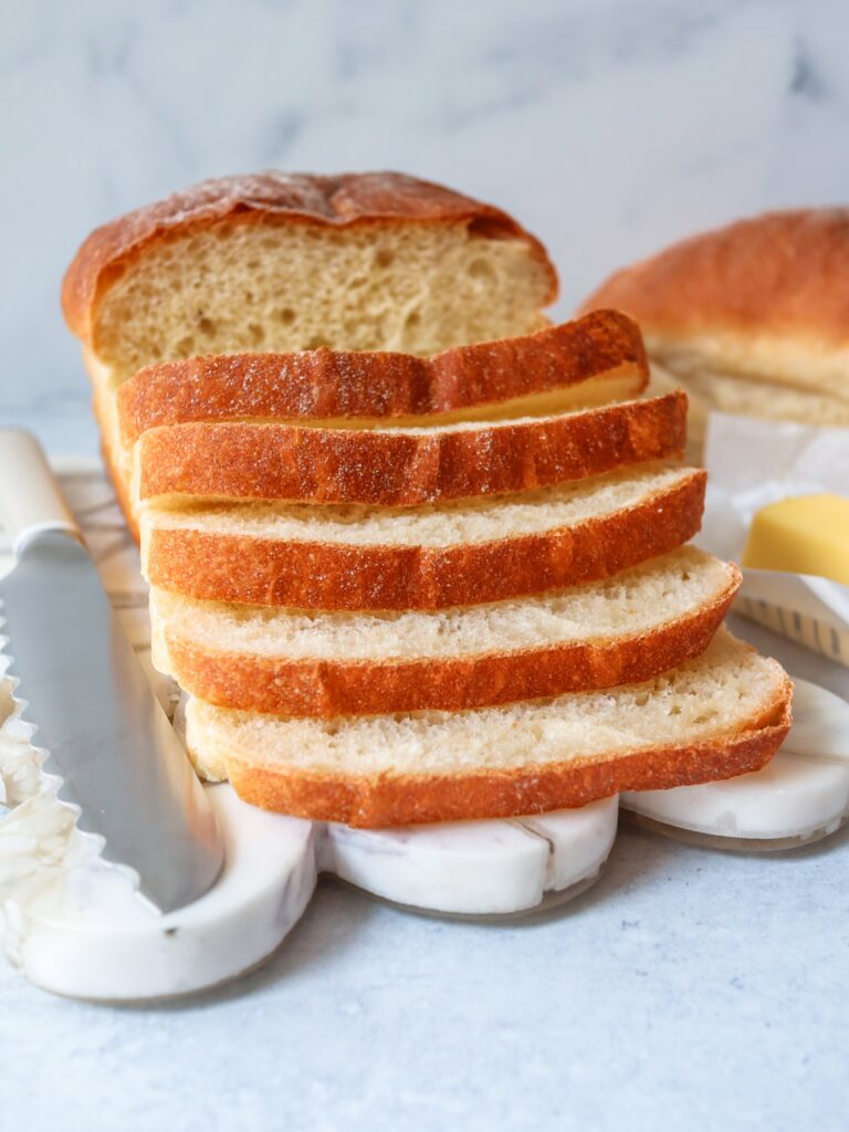 Homemade sandwich bread with knife and butter